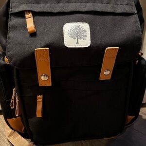 Stylish Black Backpack with Tan Accents